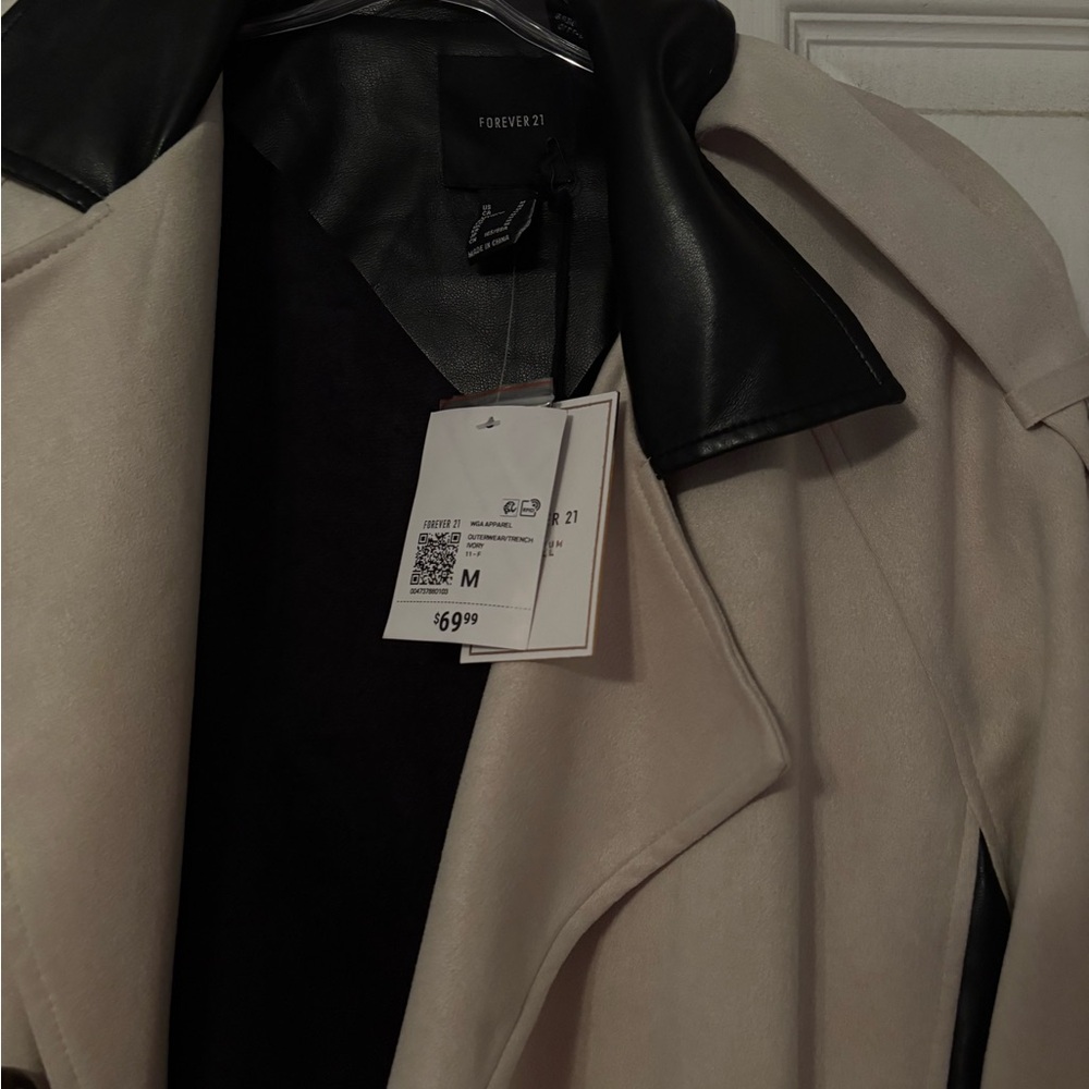 Forever21 coat. Never worn. Color is Black & Ivory